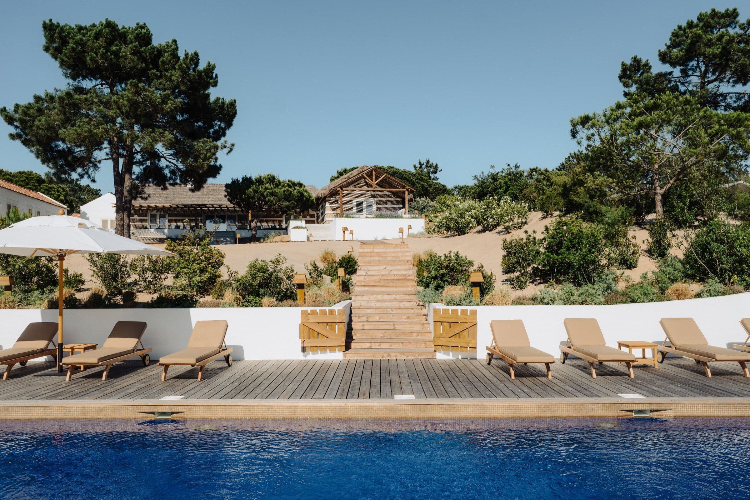 Villa Harmonia da Comporta infinity pool with tiered wooden decking, Comporta, Portugal