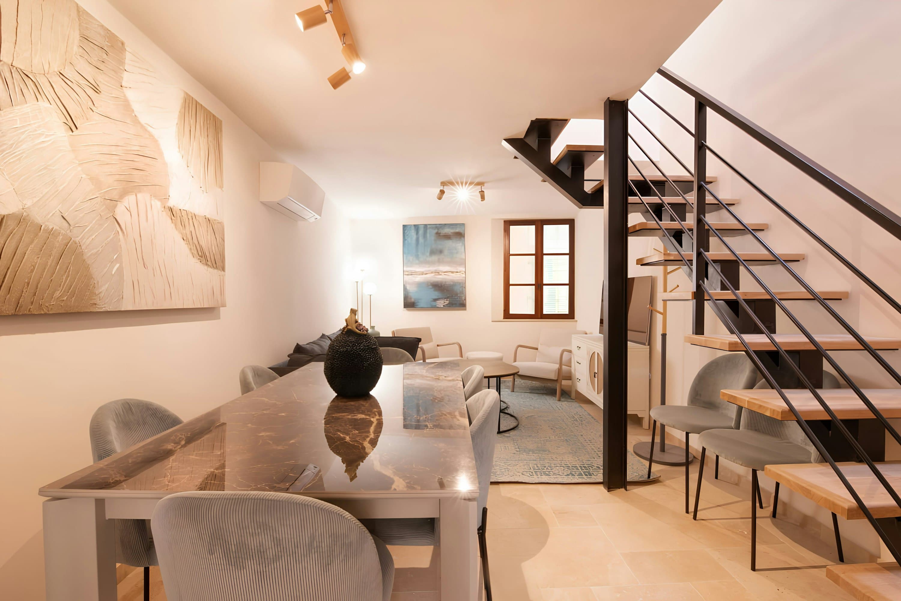 Saint Tropez Serenity open-plan living room with staircase, Saint-Tropez, French Riviera, France
