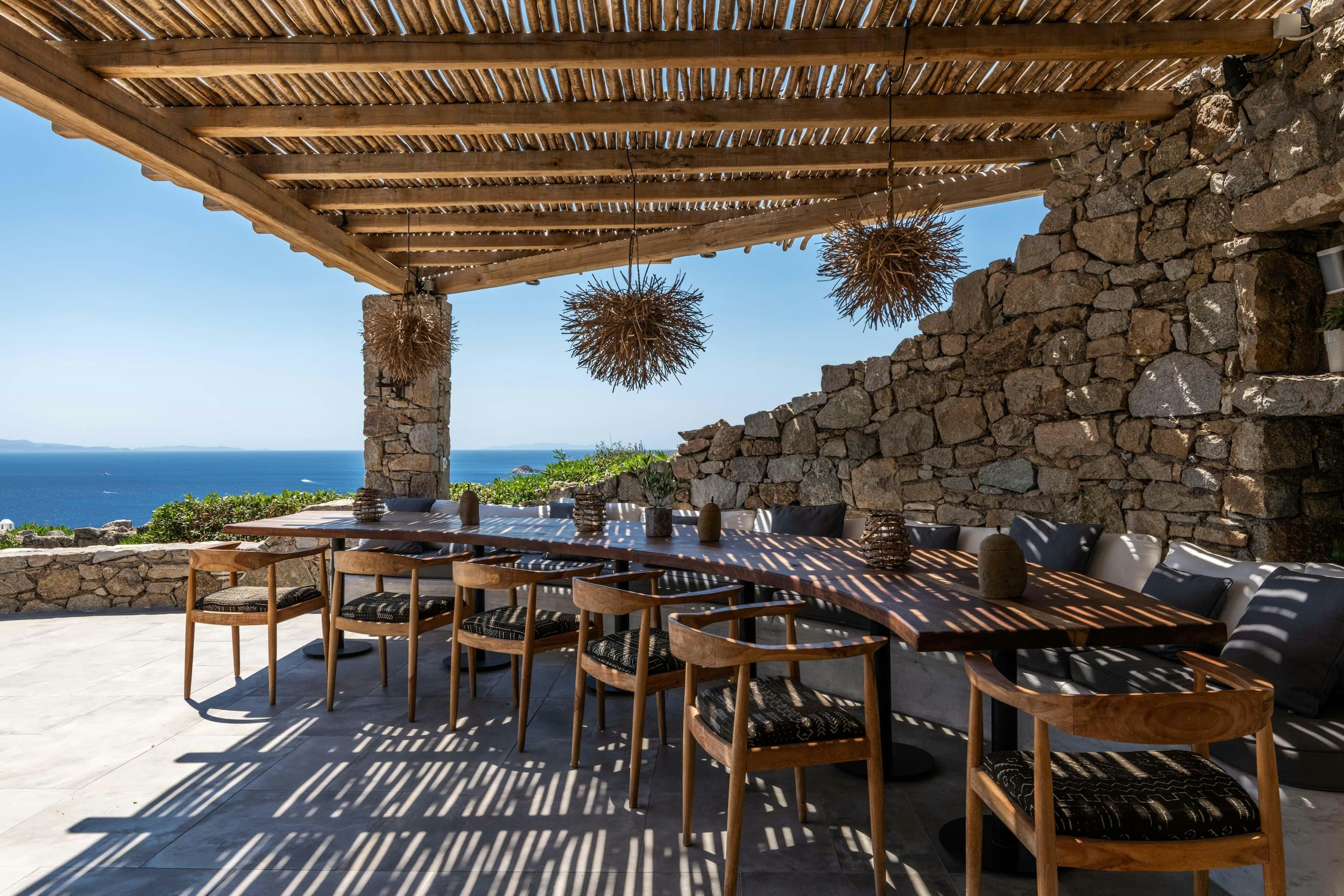 Party Invitation outdoor dining terrace with wooden pergola, Agios Lazaros, Cyclades Islands, Greece