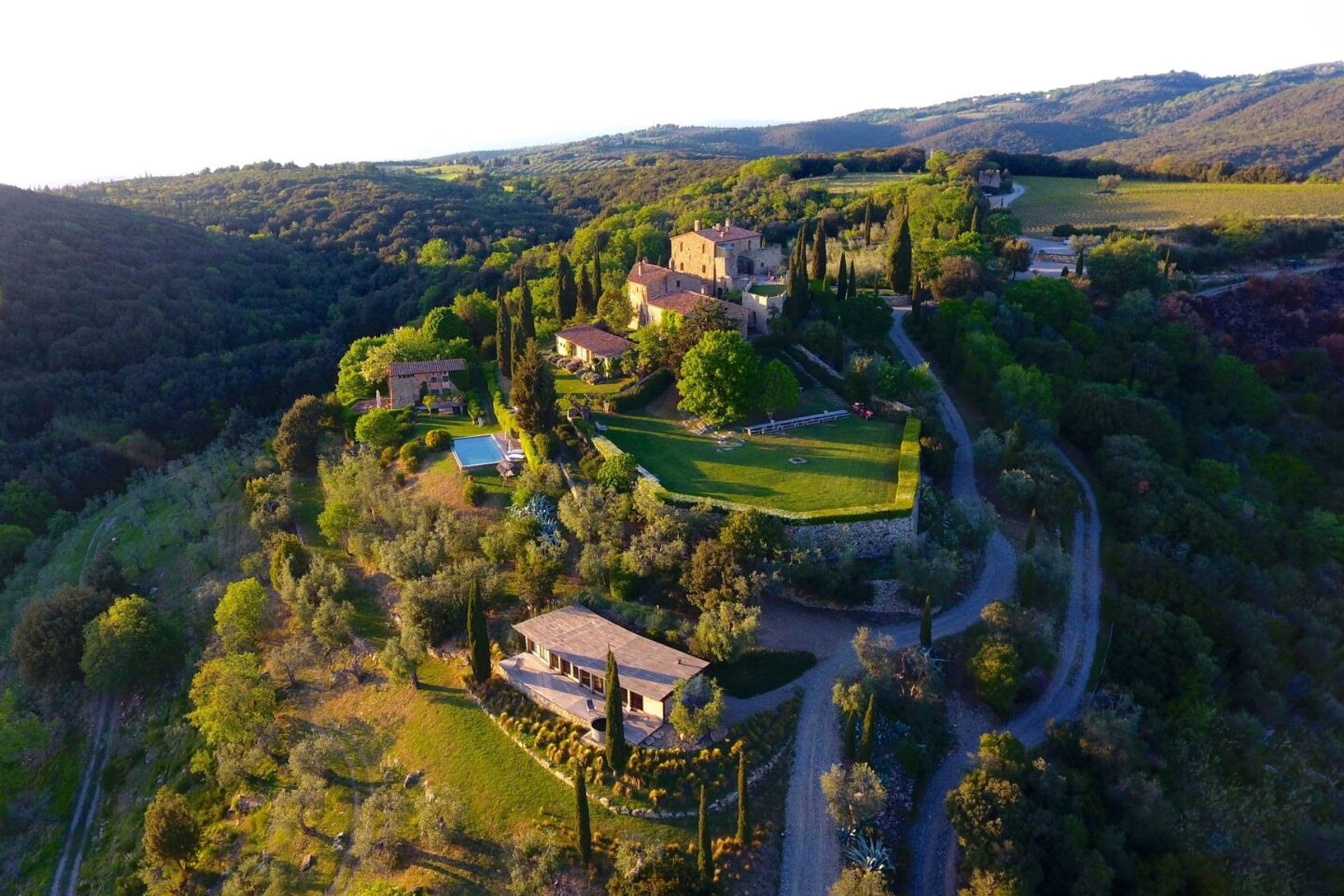 Villa Fortaleza aerial view of stone estate with gardens, Province of Grosseto, Tuscany, Italy