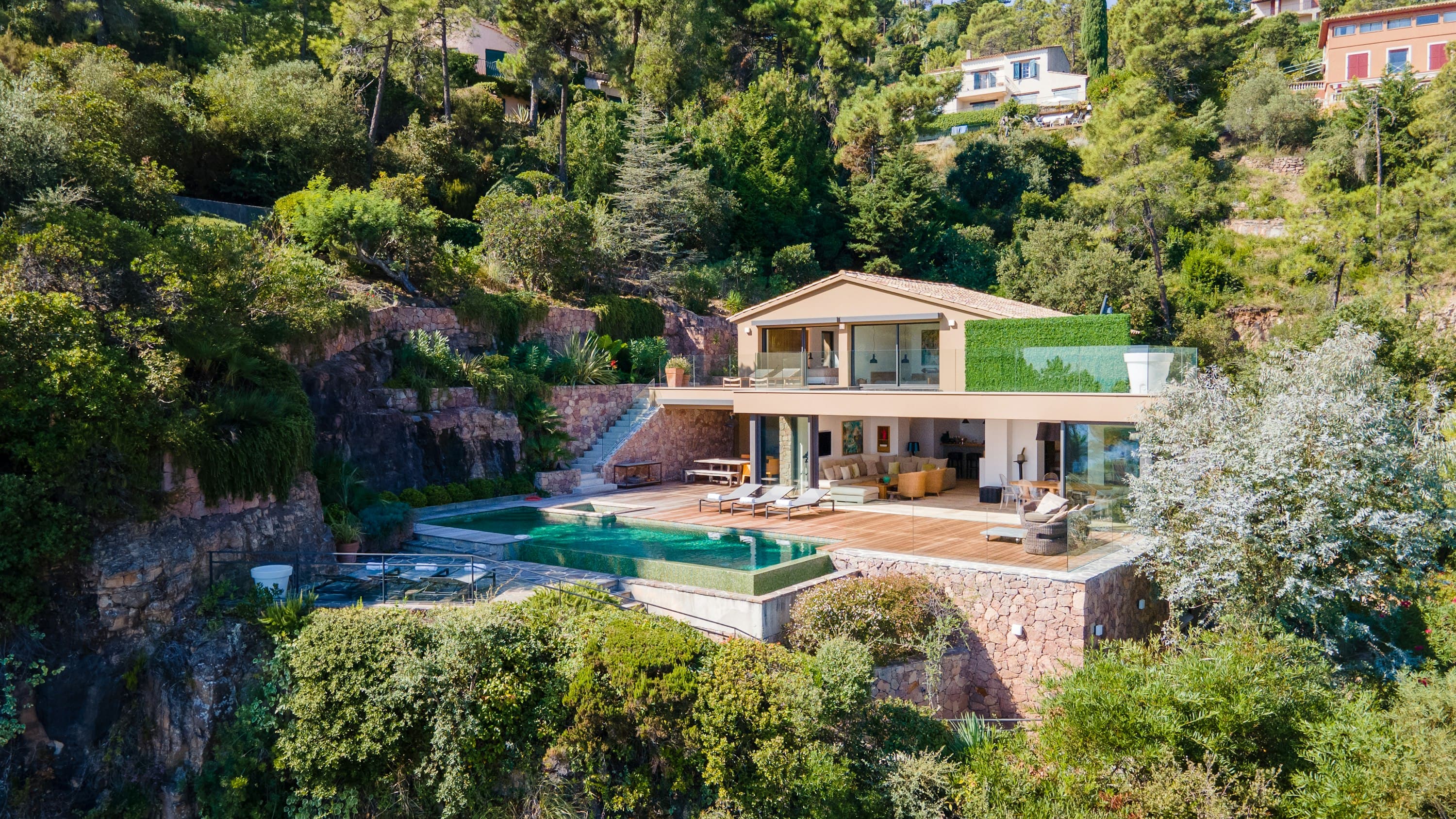 Coastal Azure villa exterior with infinity pool and terraced levels, Théoule-sur-Mer, French Riviera