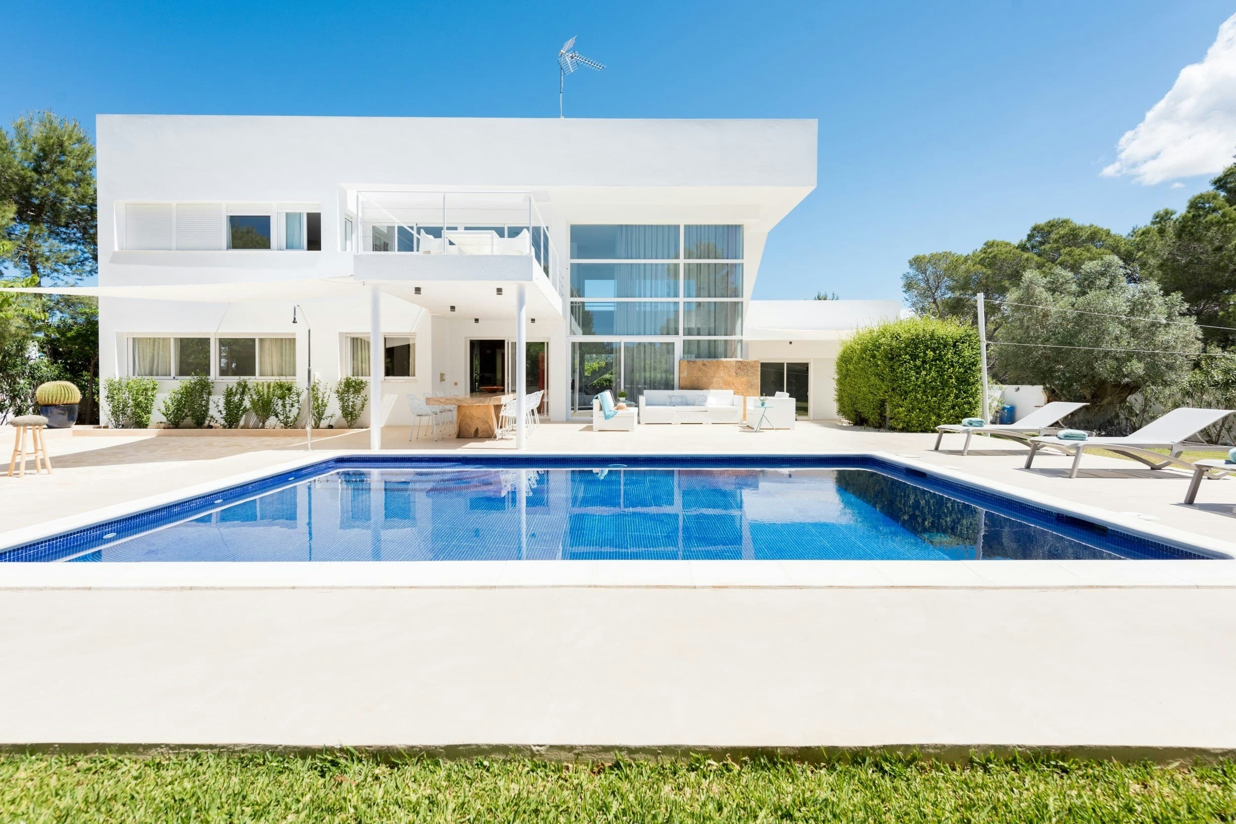 The Island Abode luxury villa exterior with blue mosaic pool, Sant Josep de sa Talaia, Balearic Islands