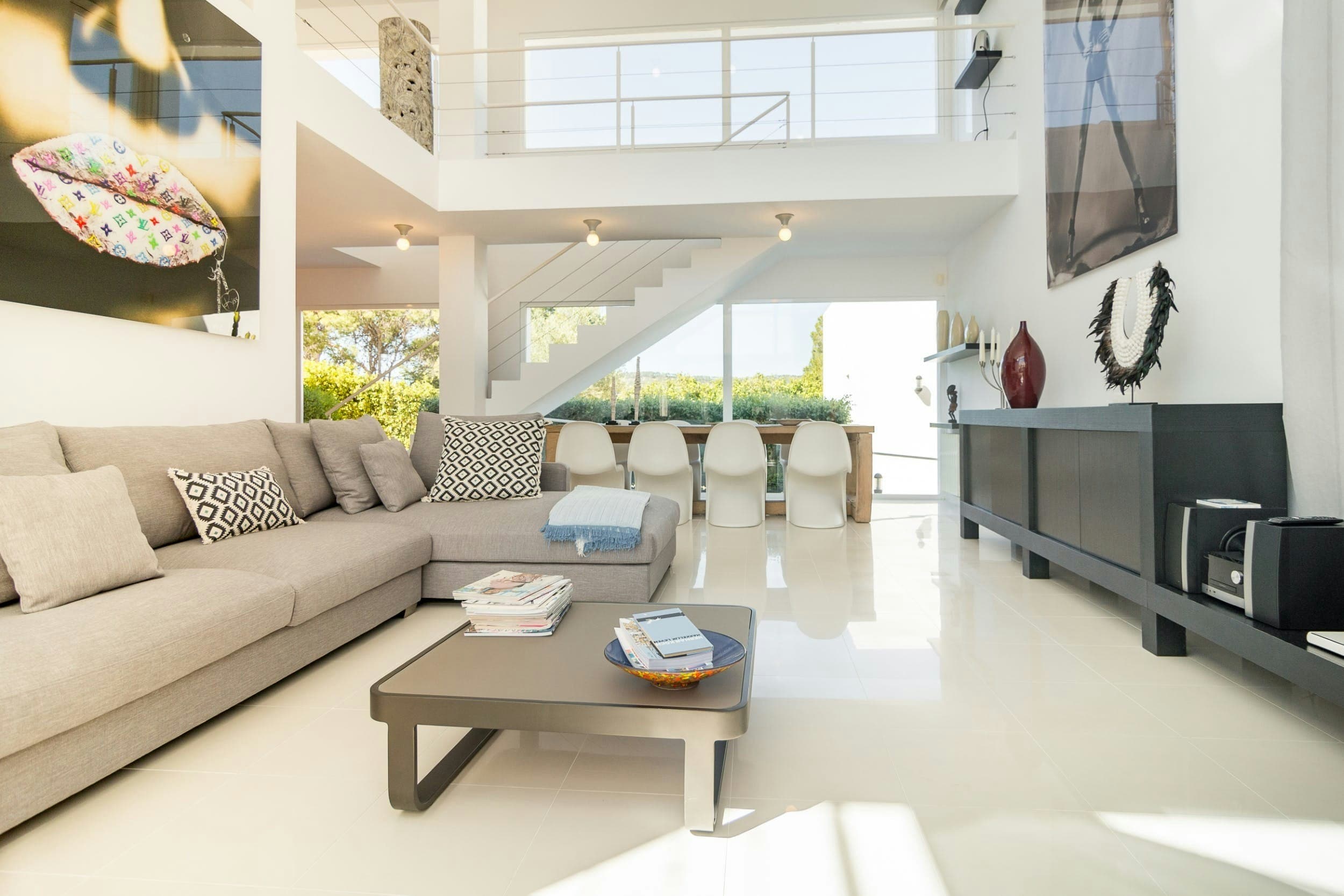 The Island Abode double-height living room with modern furnishings, Sant Josep de sa Talaia, Spain