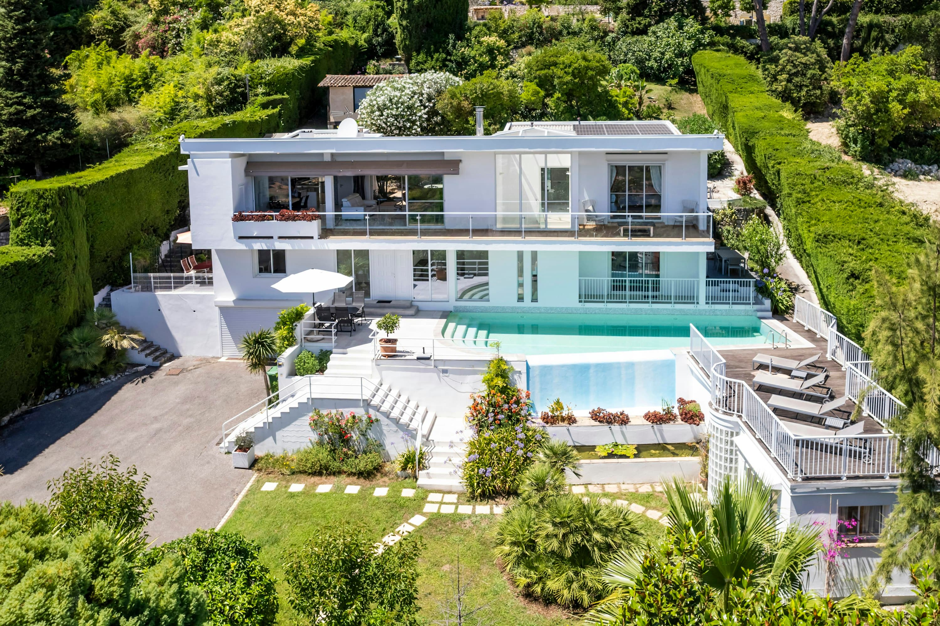 Olive and Sea villa aerial view with infinity pool and terraces, La Colle-sur-Loup, French Riviera