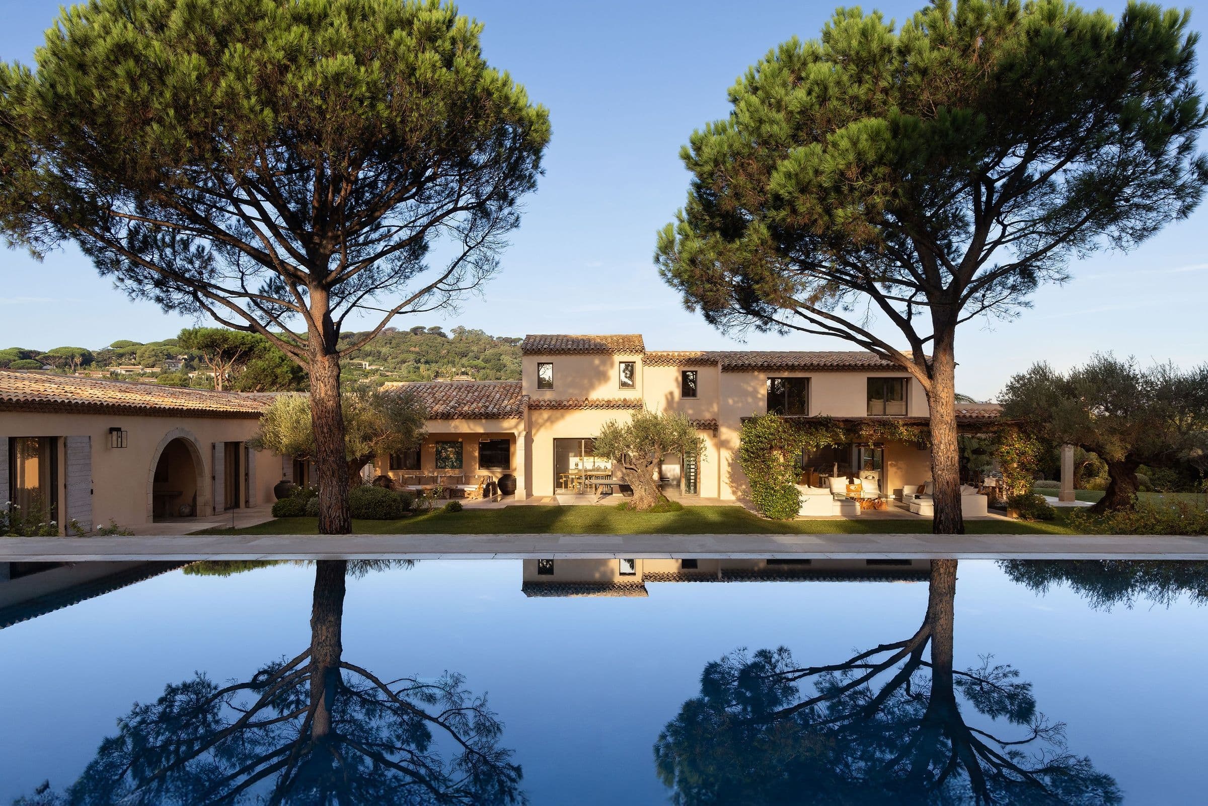 Villa Maï Taï exterior with infinity pool and stone architecture, Saint-Tropez Peninsula, France