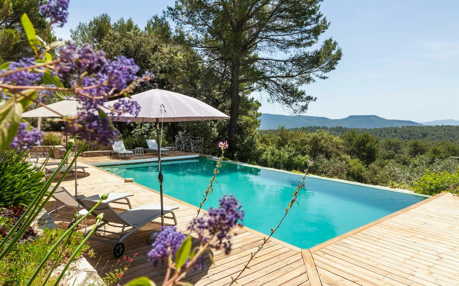 Choral Words infinity pool with mountain views and wood decking, Var, Provence, France