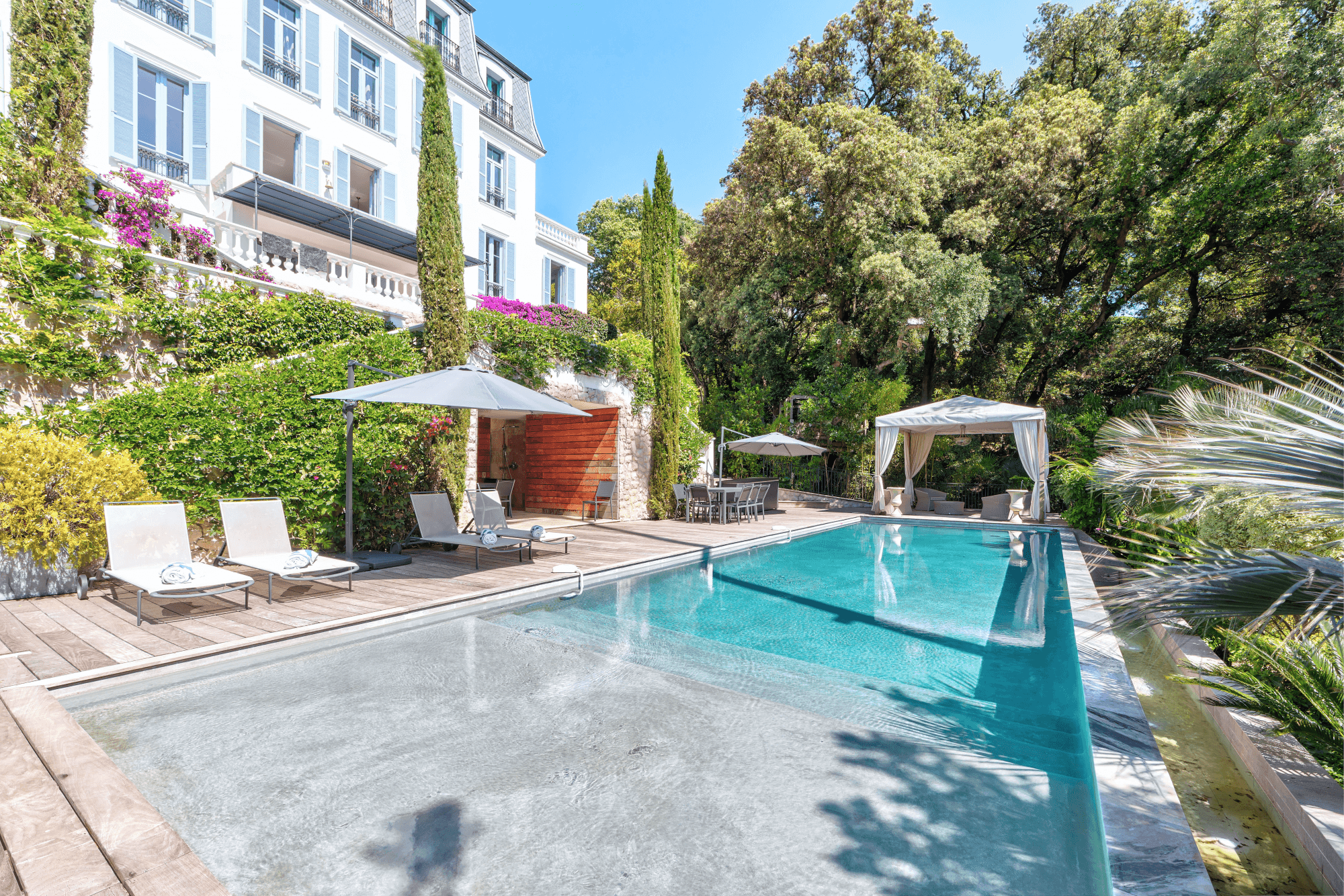 The Lark's Song infinity pool with beach entry and teak decking, Cannes, French Riviera, France