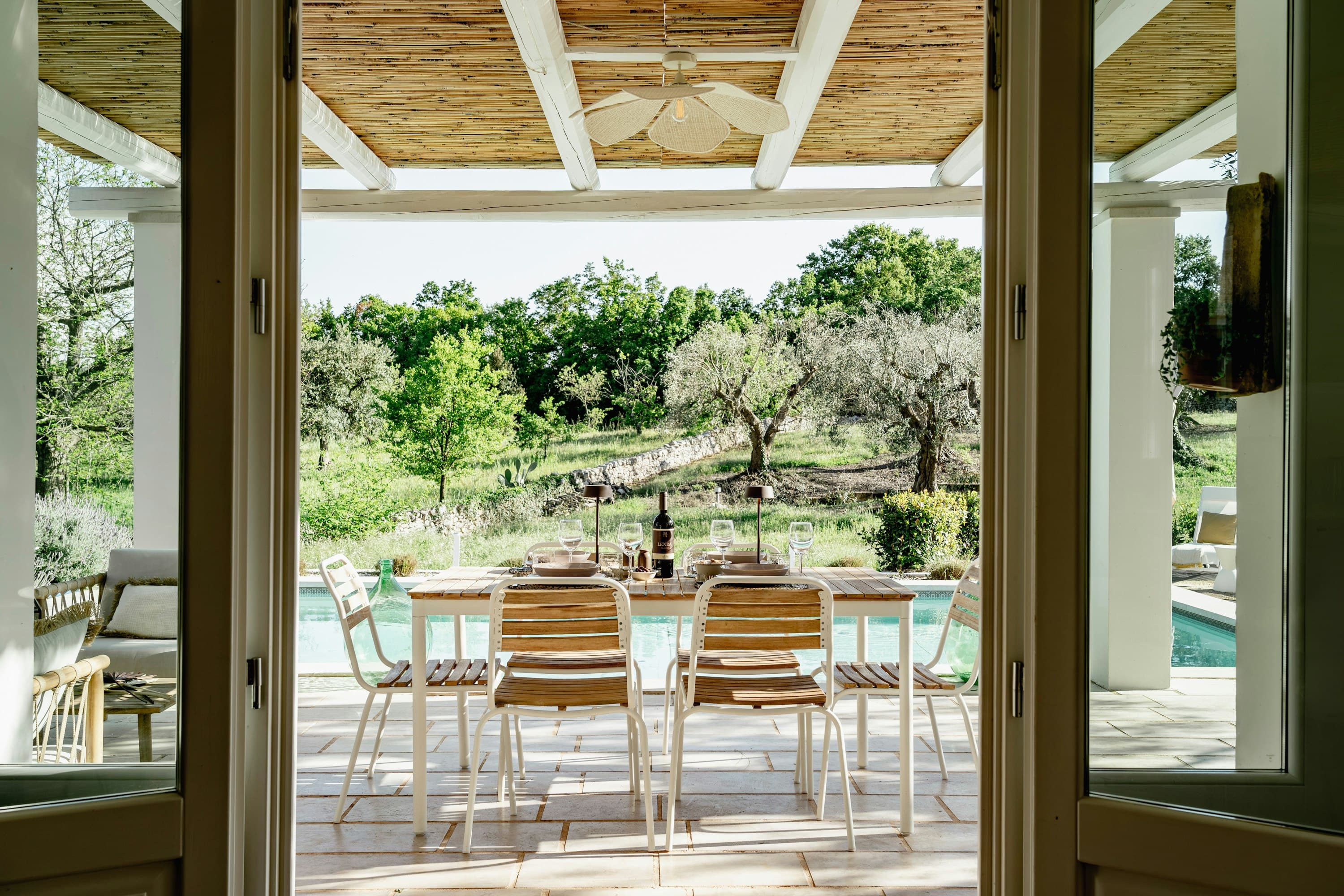 Itria Birdsong full property view with multiple trulli structures, Martina Franca, Puglia, Italy