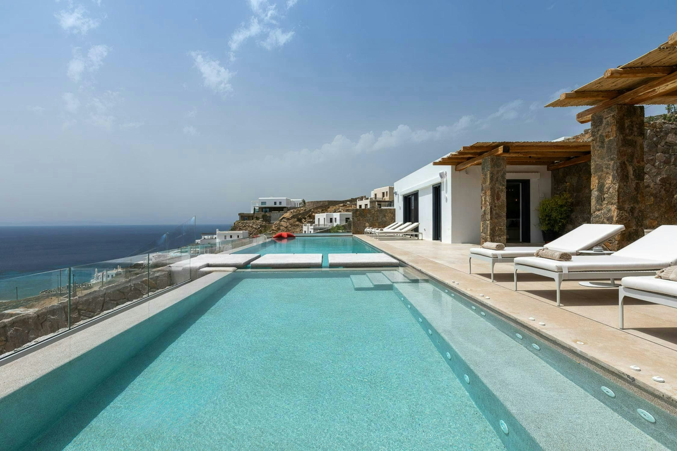 Heavenly Joy villa multi-level infinity pool terrace overlooking Aegean Sea, Mykonos, Greece