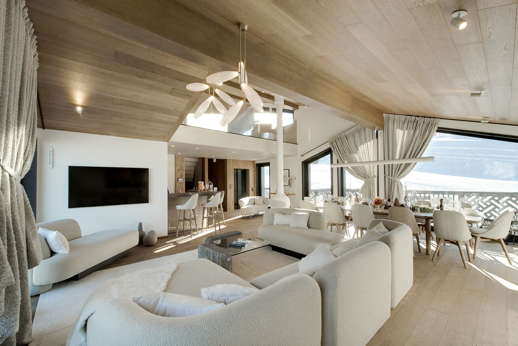 Chalet Ascension open-plan living room with vaulted ceiling, Courchevel 1650, French Alps, France