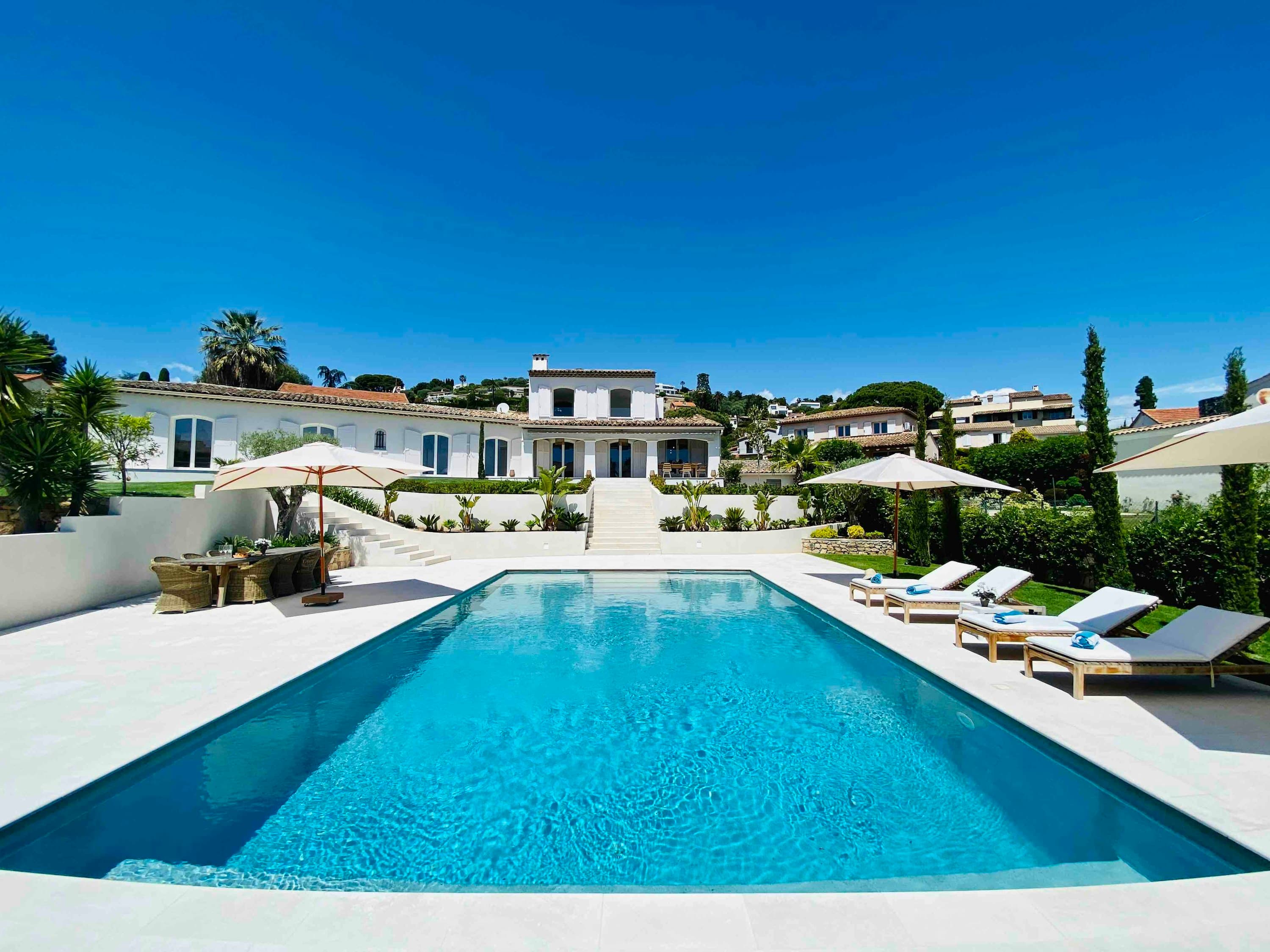 Summer's Gaze villa exterior with infinity pool and terraced gardens, Antibes, French Riviera, France