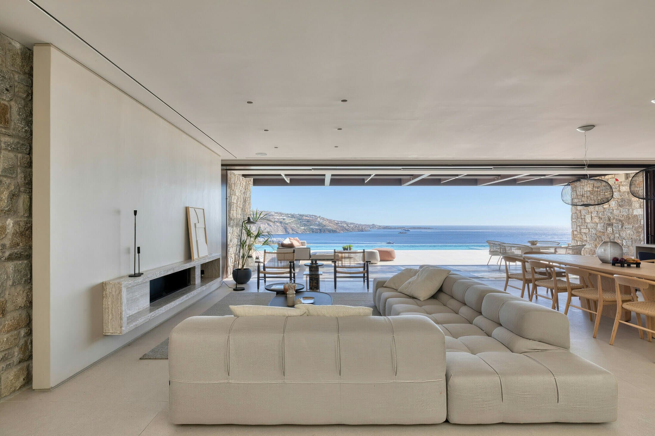 Ocean Breeze & Sea Views living room with indoor-outdoor design and sea views, Mykonos, Greece