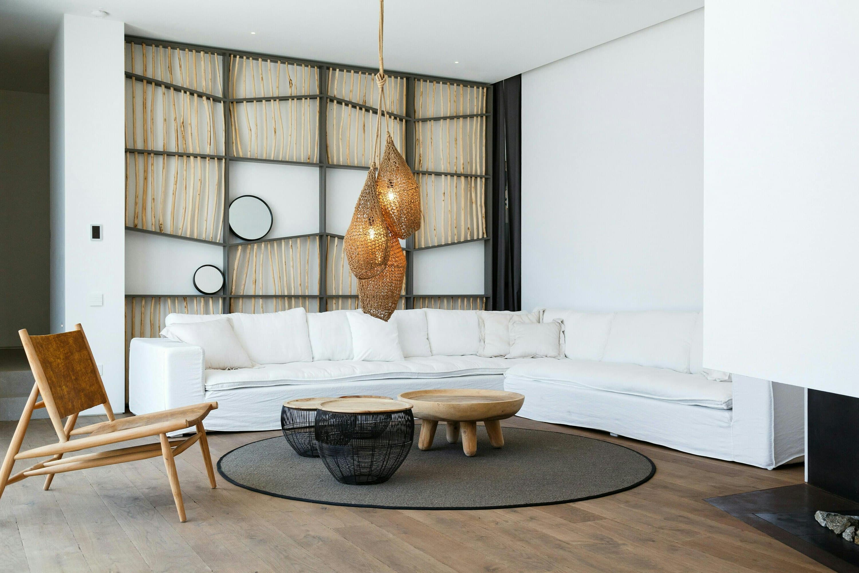 Between Stone & Sea contemporary living room with curved seating, Tourlos, Cyclades Islands, Greece