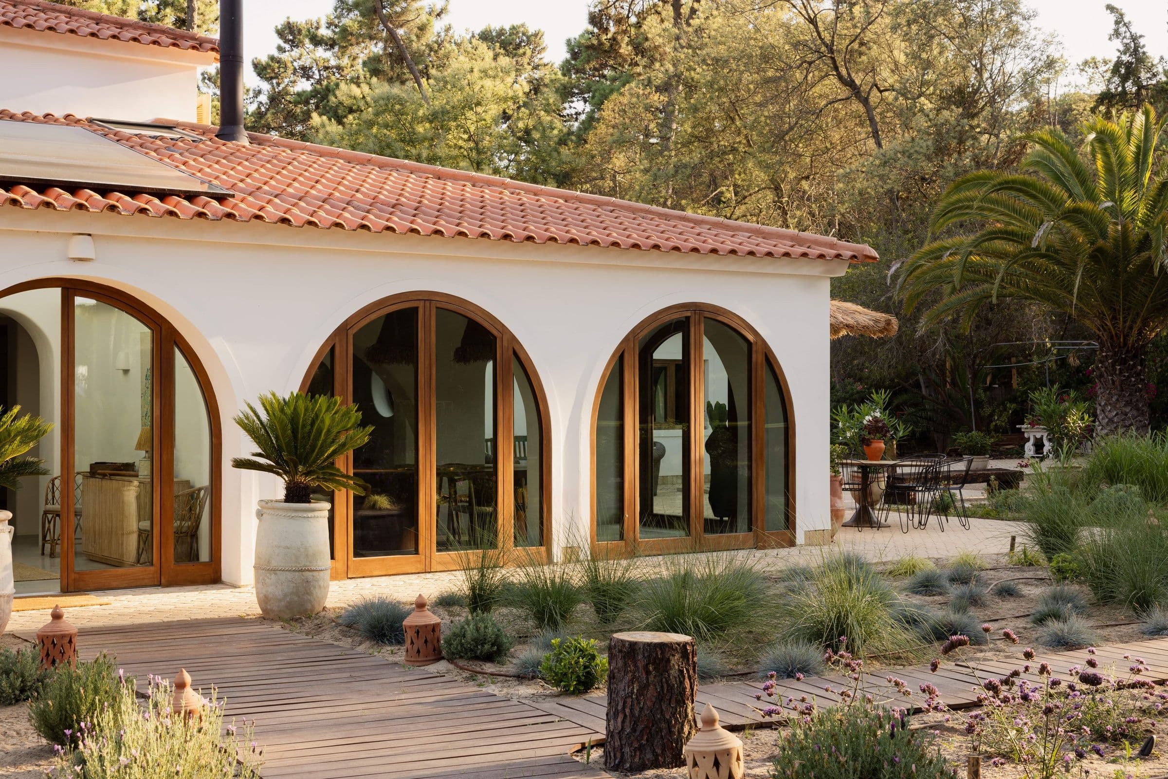 Villa Caparica garden facade with arched doors, Costa da Caparica, Portugal