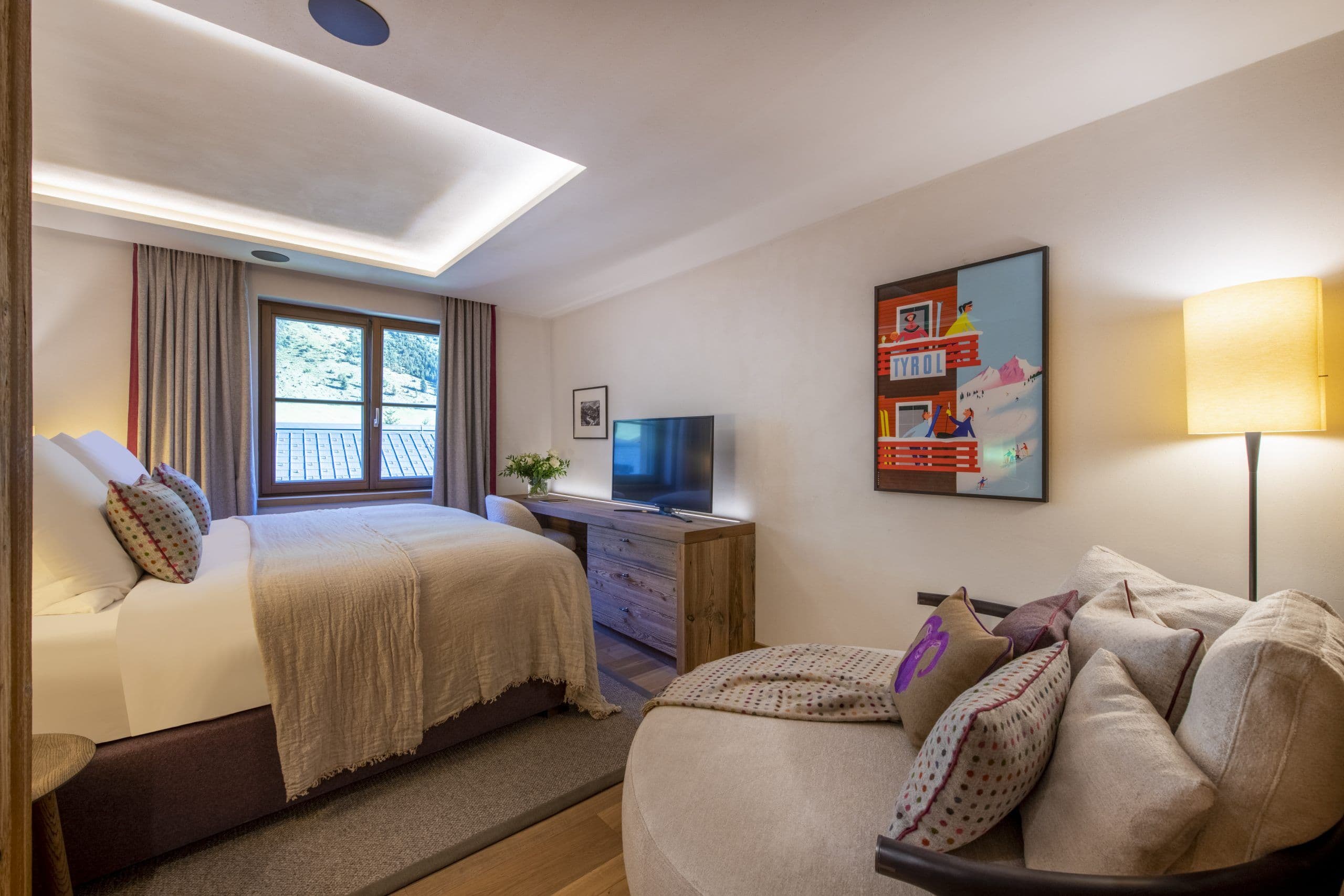 Chalech S spa-like master bathroom with freestanding tub and stone accents, Lech, Austria