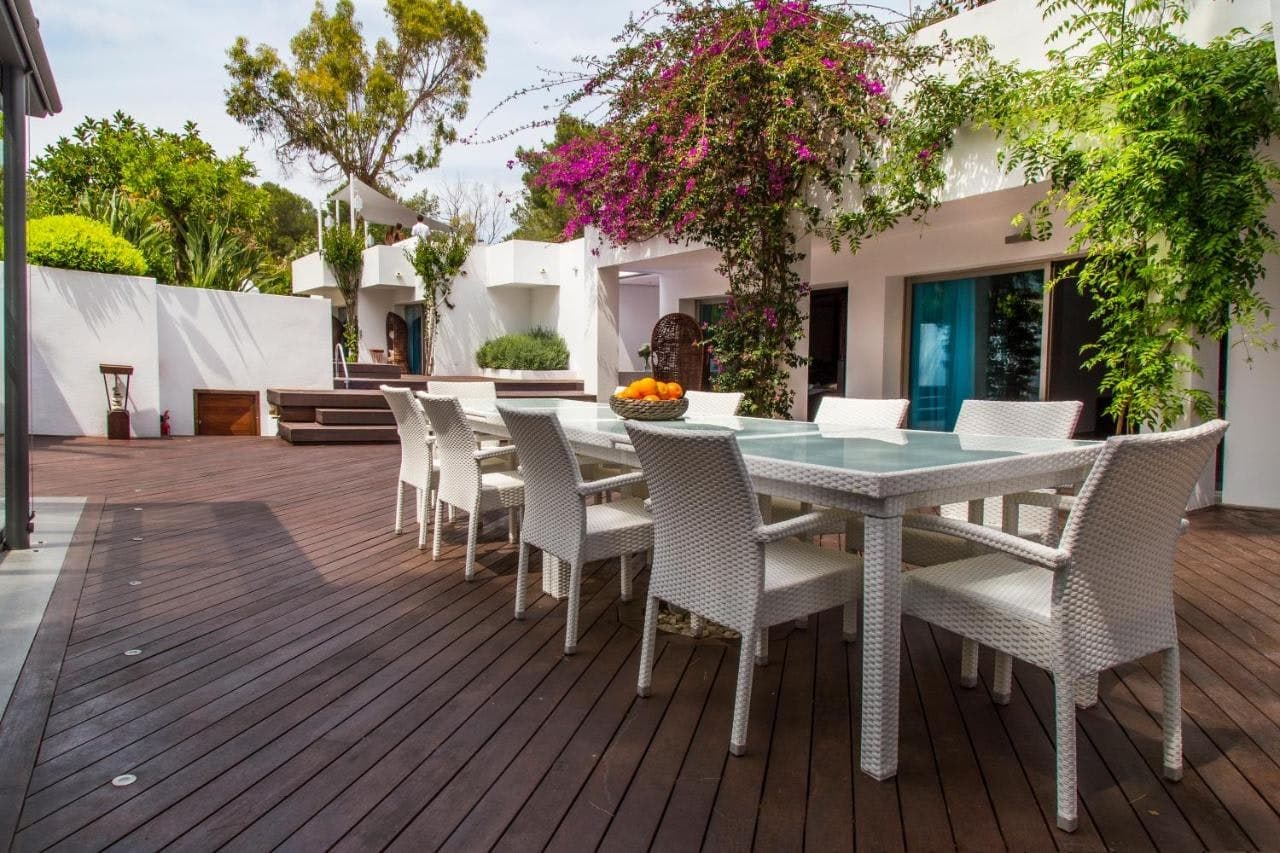 Vibrant Vinyasa outdoor dining terrace with bougainvillea, Santa Eulària des Riu, Spain