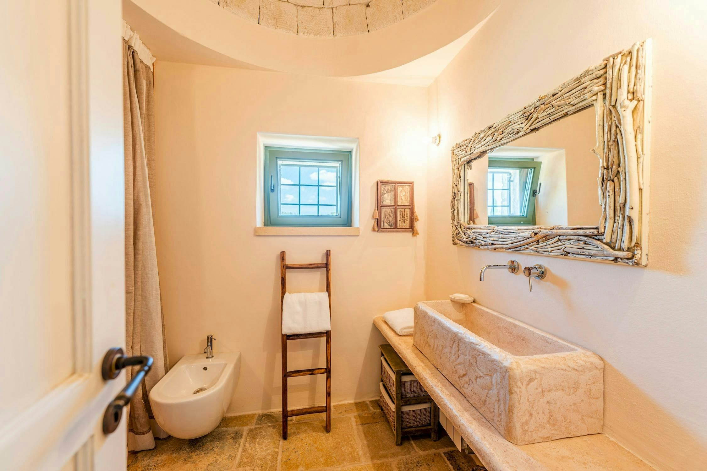 White Village Escape guest bedroom with vaulted stone ceiling, Ostuni, Puglia, Italy