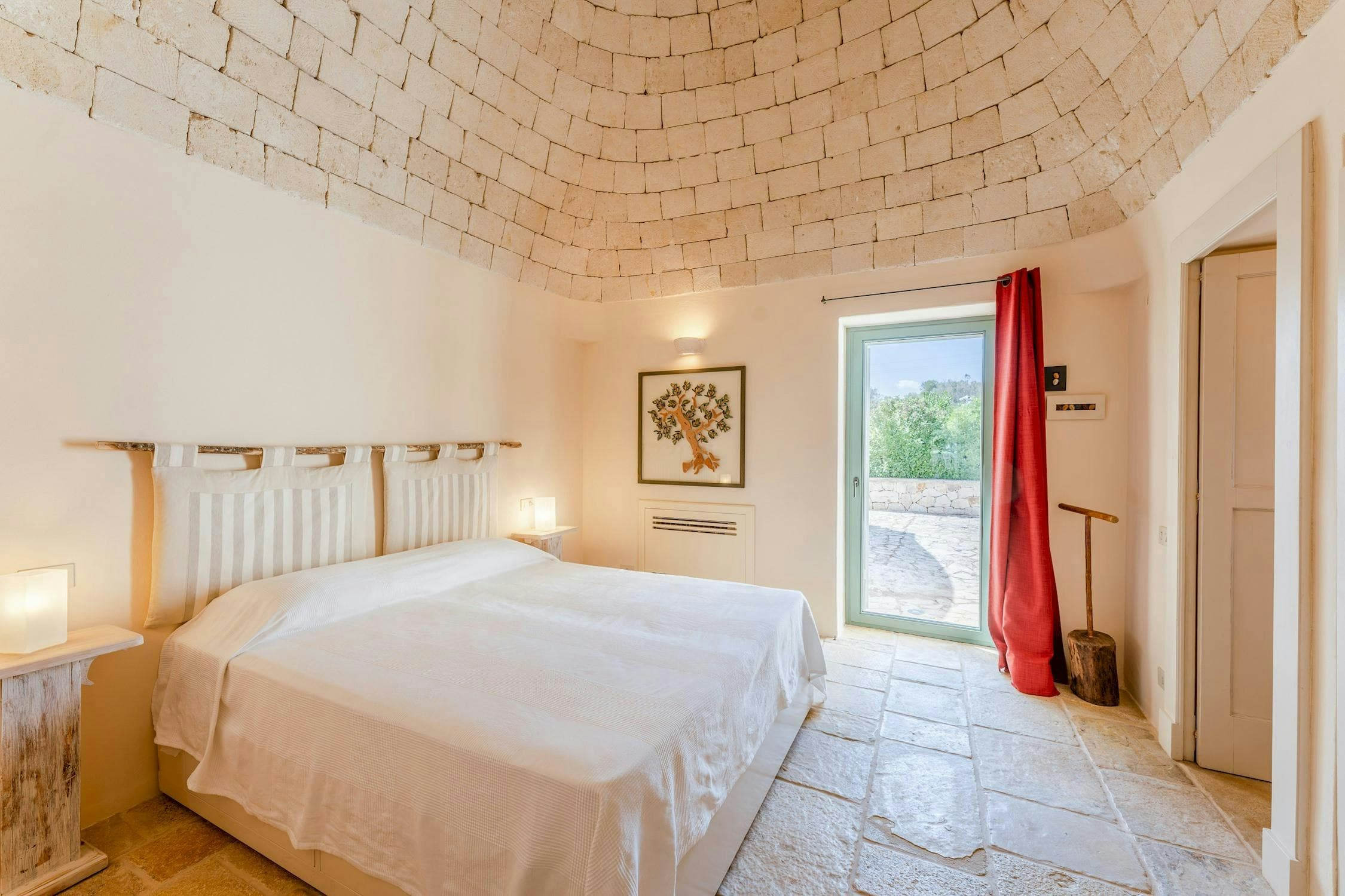 White Village Escape master bedroom with trullo conical ceiling, Ostuni, Puglia, Italy