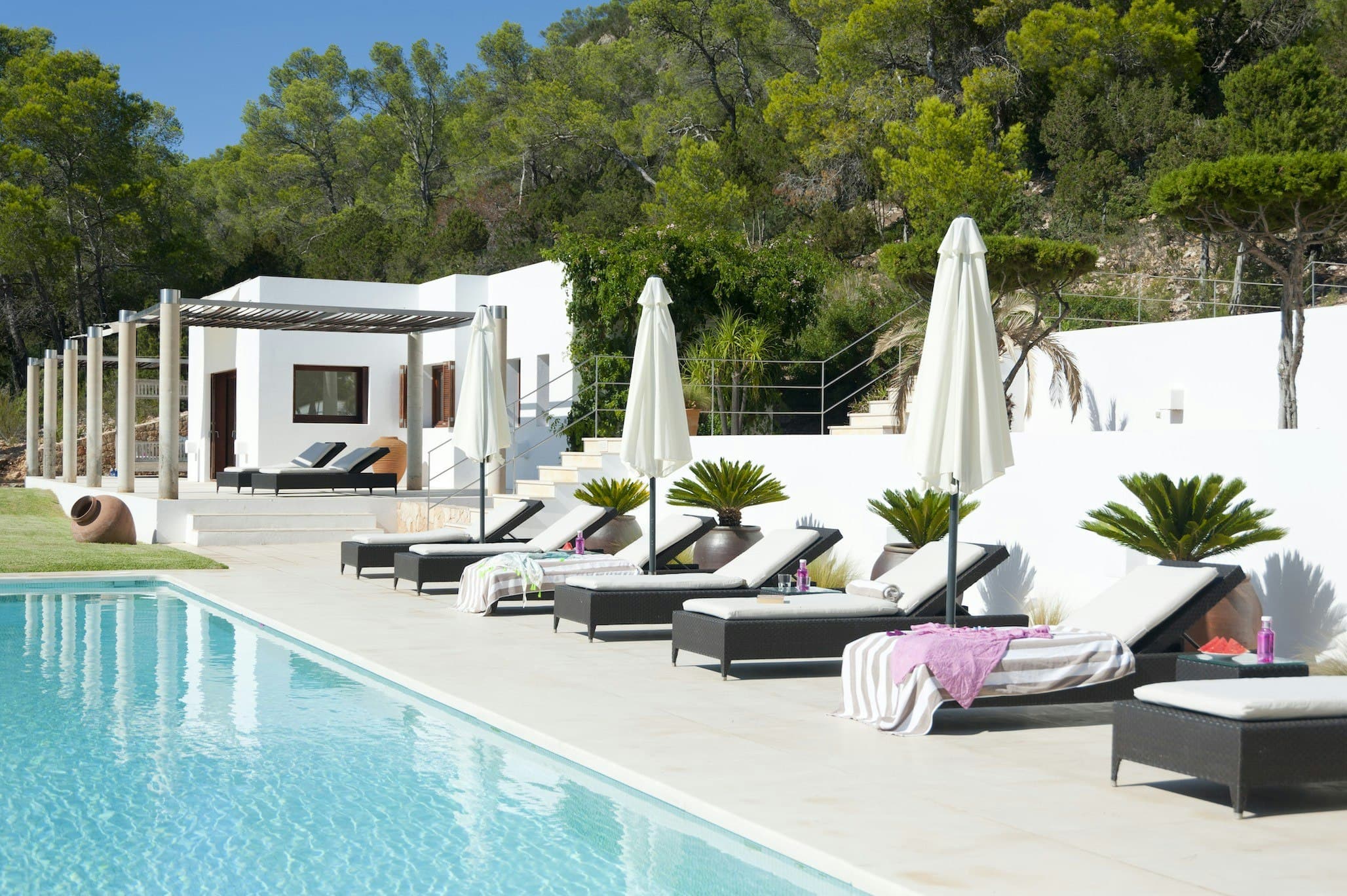 Sea Pines poolside terrace with sun loungers, Sant Josep de sa Talaia, Spain