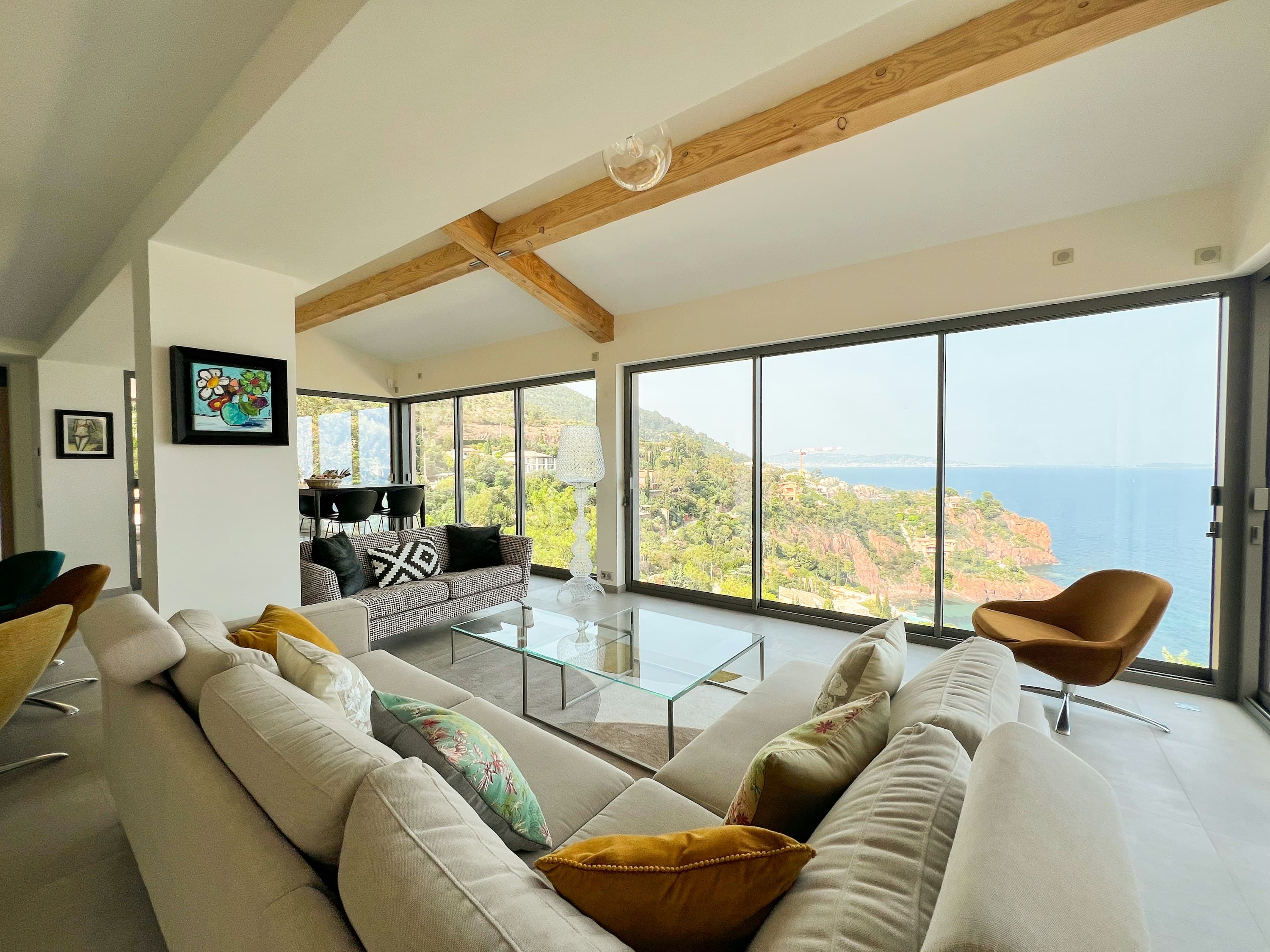 Riviera Mornings living room with wood beams and sea views, Théoule-sur-Mer, French Riviera, France